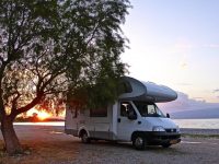 rv-sitting-by-the-lake