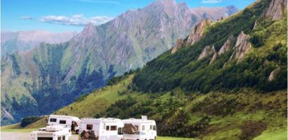 Motorhomes and travel trailers parked in the mountains