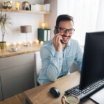 Man working from home in front of computer