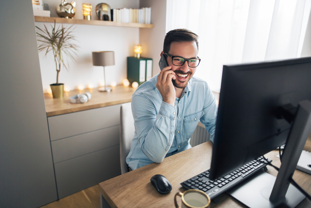 Man working from home in front of computer